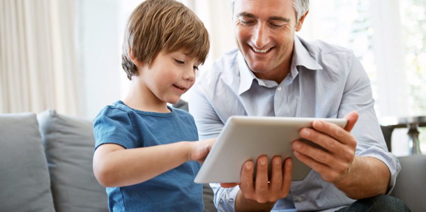 Media Use By Children: Monitor and Model iStock 000057358240 Large kid dad laptop 845x422 - Media Use By Children: Monitor and Model