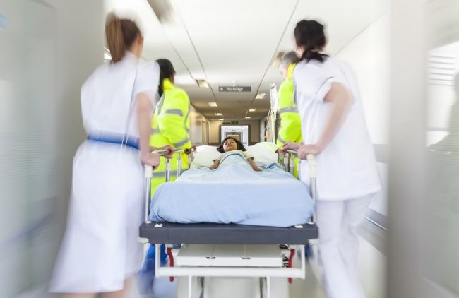 Why EHR Optimization Will be a Dominant Trend over the Next Three Years Motion Blur Stretcher Gurney Child Patient Hospital Emergency