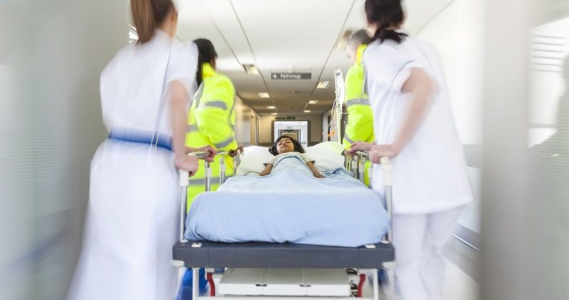 How a Pediatric Focused EHR Can Help Parents Protect Their Kids from Firearm Accidents Motion Blur Stretcher Gurney Child Patient Hospital Emergency