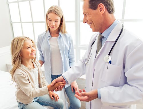 3 Tips to Improve the Patient Experience in Your Pediatric Practice Child and her mother at a consultation with their pediatrician.