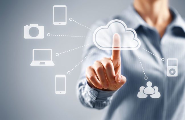 Cloud-based EHR: Worth it? Illustration representing data stored in the cloud, being shared by many people and devices