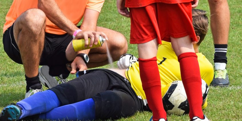 Can an EHR Platform Help Prevent Injuries From Youth Sports? Youth sports injury on field