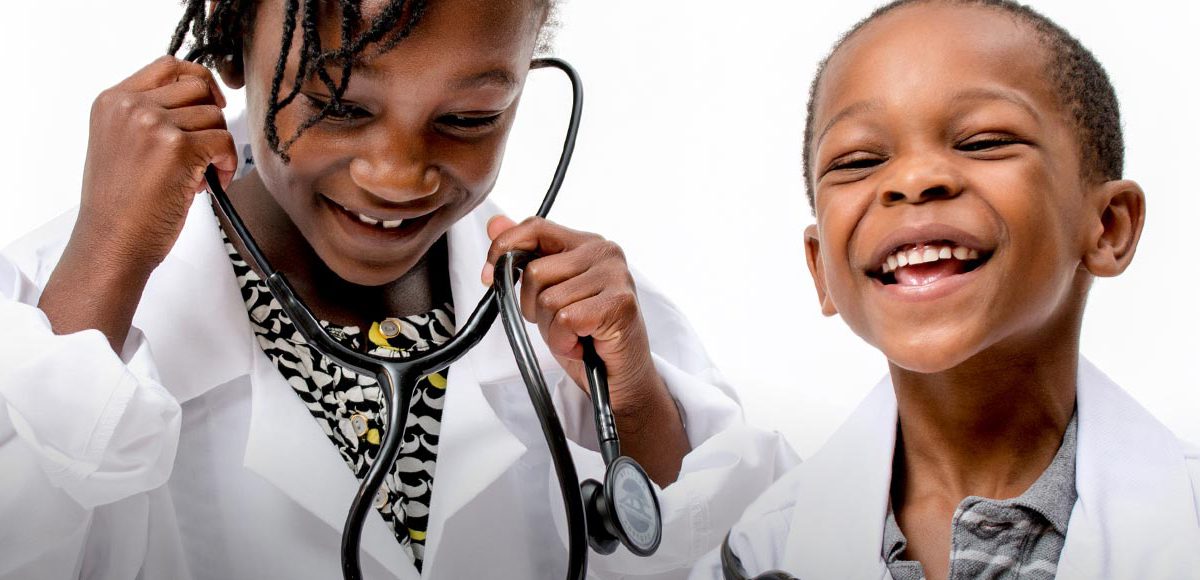 PCC News Kids dressed in doctor's clothes